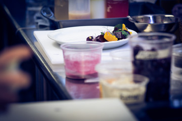 Dish being prepared in kitchen
