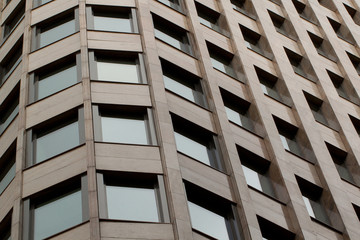 Modern office building with a rhythmic arrangement of windows