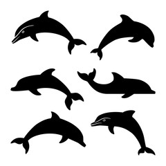 Naklejka premium dolphin silhouettes set