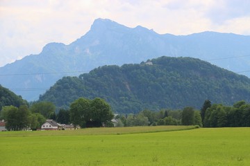 On the foothills of the alps: View of the mountains Untersberg and Kapuzinerberg. Hallwang, next to Salzburg. Austria. Europe. 