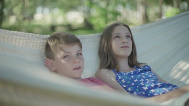 Children in hammock together