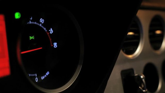Car tachometer speed. Engine rpm meter. Auto tachometer arrow revving, Tachometer revving. Close up of tachometer display. Rmp gauge