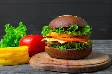 Homemade hamburger with fresh vegetables