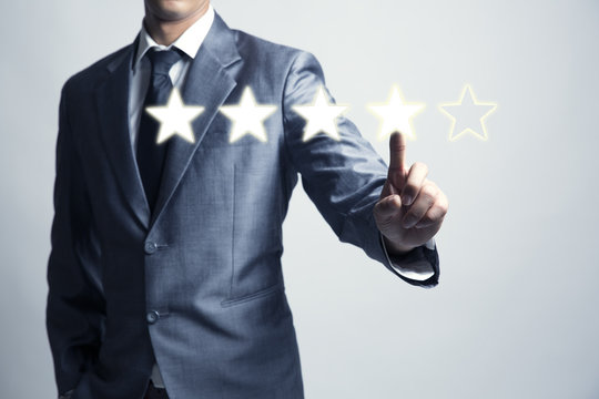Businessman is give star rating, business background, level business service and product.