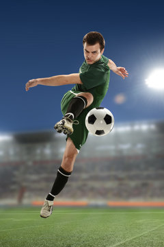 Soccer Player Kicking the ball