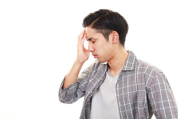 頭痛を訴える男性