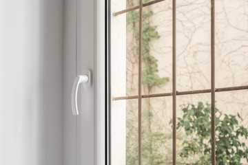window with metal bars - burglar-proof window detail
