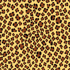 Fototapeta na wymiar Seamless orange black and brown leopard animal pattern design vector