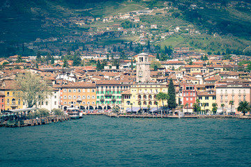 Fototapeta na wymiar The town of Riva del Garda seen from the lake.