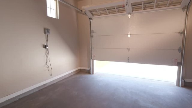 Interior Garage Door Opening Move Up to Ceiling. starting at garage floor inside the garage and moves up as garage door opens
