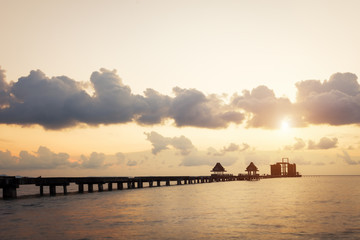 Obraz premium Landscape of Wooded bridge in the port between sunrise