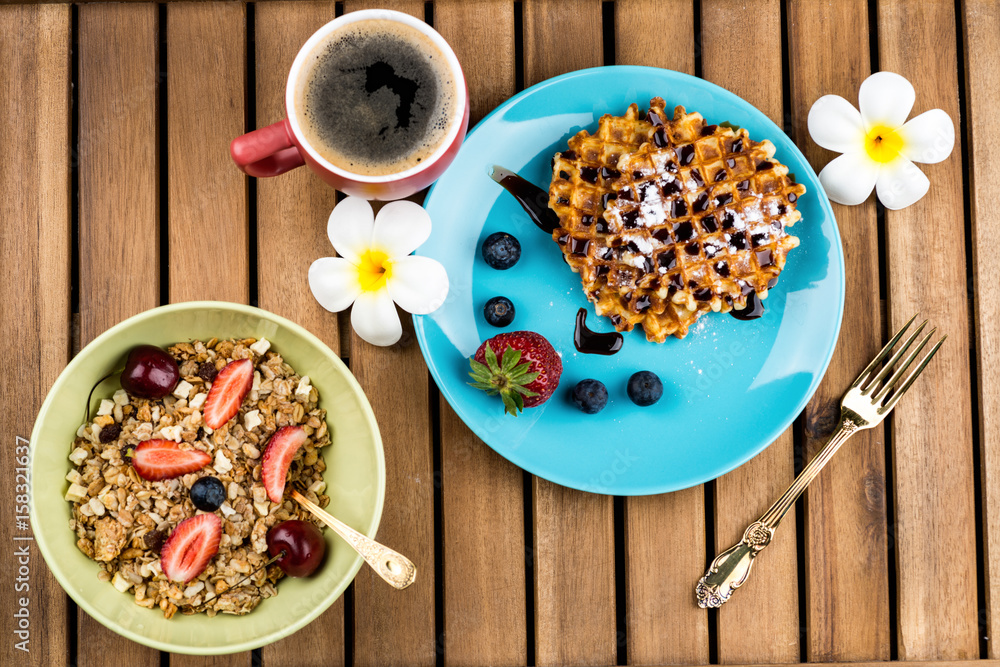 Wall mural Photo of healthy breakfast on wooden background