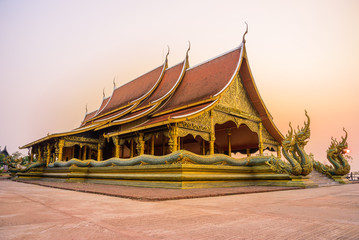 Fototapeta na wymiar Watsirindhoronwararam Ubon Ratchathani Thailand in the sunset,public.