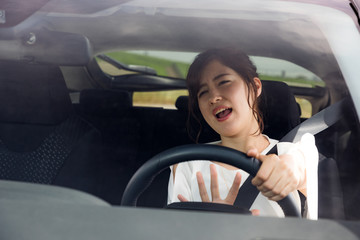Obraz na płótnie Canvas getting annoyed female driver.
