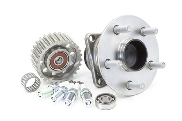 Bearing and ignition plugs for car isolated on white, automotive part