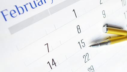 Golden Pen on Calendar 