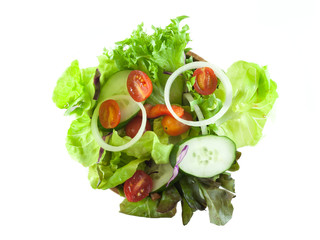 Top view of vegetable salad isolated on white