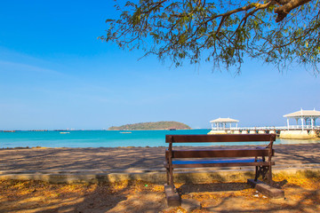 bench with si chang island seascape in clear sky day