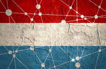Flag of the Netherlands. Low poly concept triangular style. Molecule And Communication Background. Connected lines with dots. Concrete grunge texture.