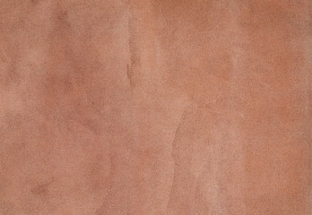 Orange/Brown painted wall texture as colorful background