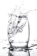 water isolate splash in cup on white background