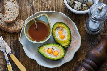 Baked avocado with quail eggs