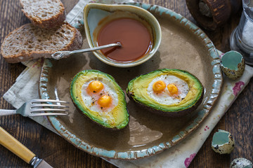 Baked avocado with quail eggs