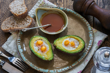Baked avocado with quail eggs