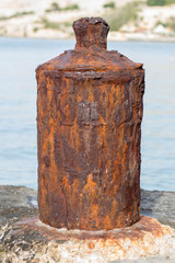 Naklejka premium Rusty bollard at Ta' Xbiex in Malta.