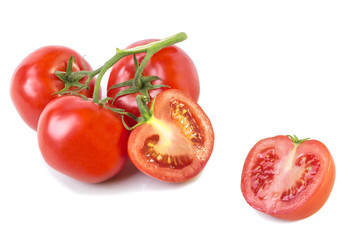 Branch of ripe fruits tomato with half cut
