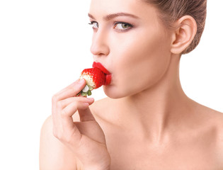 Beautiful woman with strawberry on white background