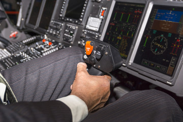 Joystick to control the helicopter in the pilot's hands © ilyaplatonov