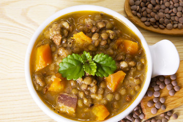 Lentil casserole on wooden table