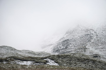 Beautiful Winter landscape image around Mam Tor countryside in Peak District England