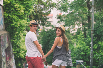 Couple in love holding hands.