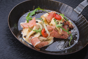 breakfast of pancakes and prosciutto