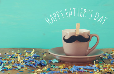 Cup of coffee with mustache. Father's day concept