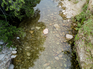 Aerial view of stones in river in Corsica
