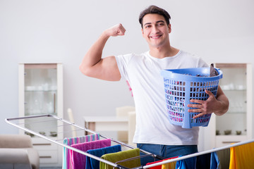 Man doing laundry at home