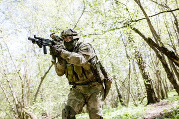 Fototapeta premium One officer with submachine gun