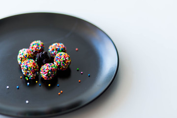 Useful candy homemade chocolate in the hands of