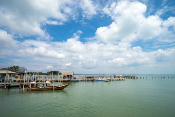 Fototapeta premium Fisherman boats anchored at Tanjung Piai jetty. Tanjung Piai is a cape in Johor, Malaysia. It is the most southern point of mainland Asia.