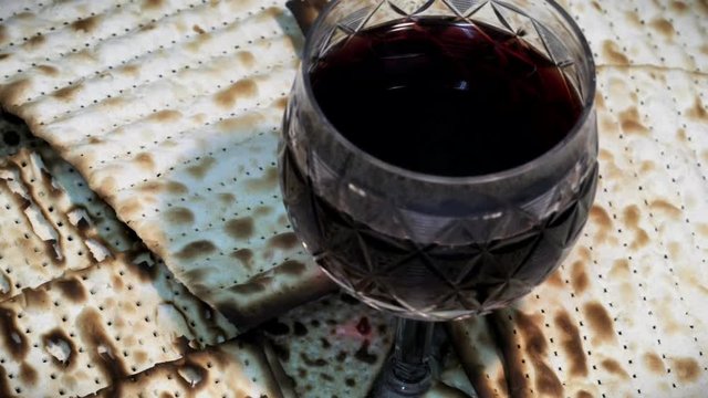 View From Above on Passover Red Wine and Matzoh, Jewish Holiday Bread. Macro