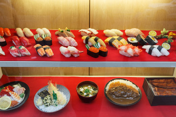  fake sushi in display window - plastic food
