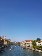 VENICE, ITALY - MAY 18, 2017 : cityscape of Venice city with its boats, gondola and beautiful architecture, in Italy.