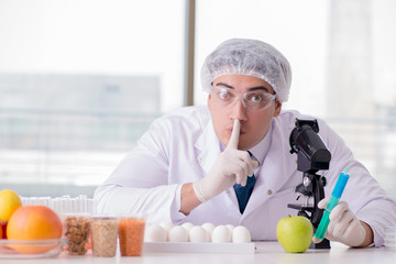 Nutrition expert testing food products in lab