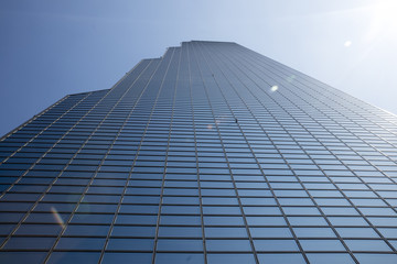 skyscrappers which is made of mirrors whole of the wall