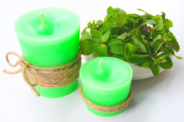 Fototapeta na wymiar Green candle Pepper Mint Aroma candle 