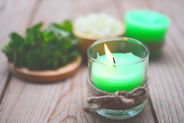 Obraz na płótnie Canvas Green candle Pepper Mint Aroma candle 