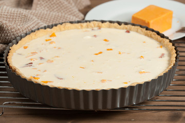 Cooking Process Of Quiche Lorraine With Red Leicester Cheese. Traditional British Food.